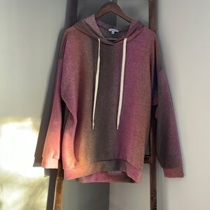 Woman’s ombré color hoodie.